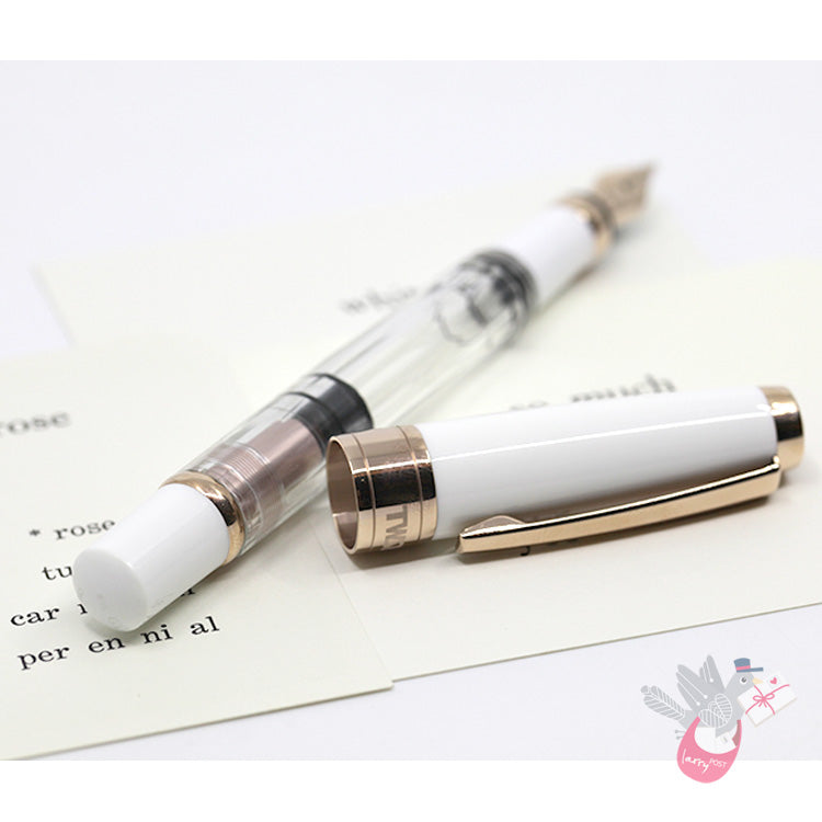 TWSBI Diamond 580 Rose Gold II Fountain Pen - Clear / White with rose gold trim - Broad Nib
