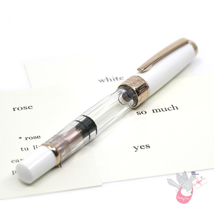 TWSBI Diamond 580 Rose Gold II Fountain Pen - Clear / White with rose gold trim - Broad Nib